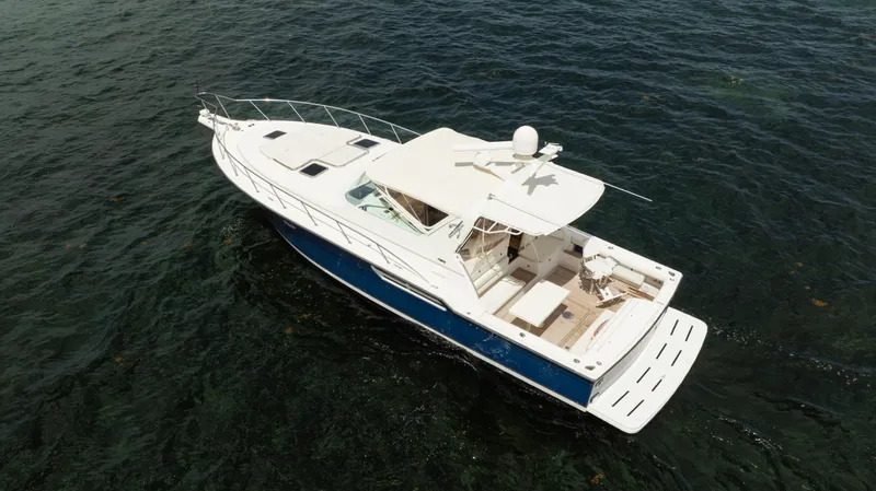  Yacht Photos Pics 1998 Tiara Yachts 4300 Open cruising on the water, aerial view.