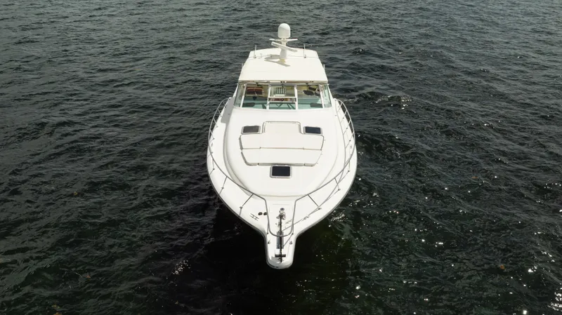  Yacht Photos Pics 1998 Tiara Yachts 4300 Open cruising on open water, aerial view.