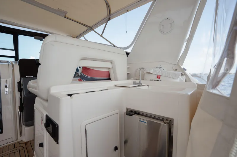  Yacht Photos Pics 1998 Tiara Yachts 4300 Open interior with seating and kitchenette area.