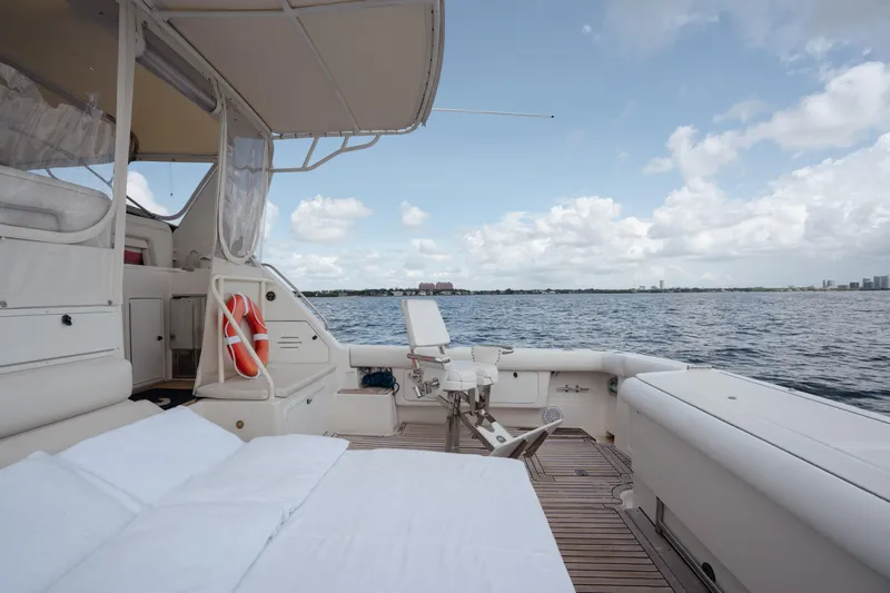  Yacht Photos Pics 1998 Tiara Yachts 4300 Open, spacious deck with ocean view, clear sky.