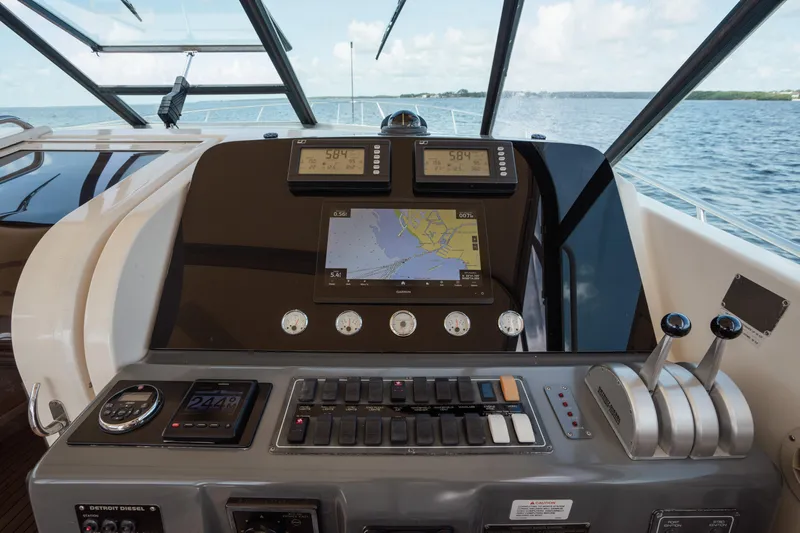  Yacht Photos Pics Cockpit of 1998 Tiara Yachts 4300 Open with navigation and control systems.