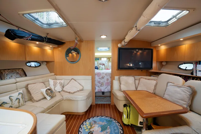  Yacht Photos Pics Luxurious interior of 1998 Tiara Yachts 4300 Open with plush seating and modern amenities.