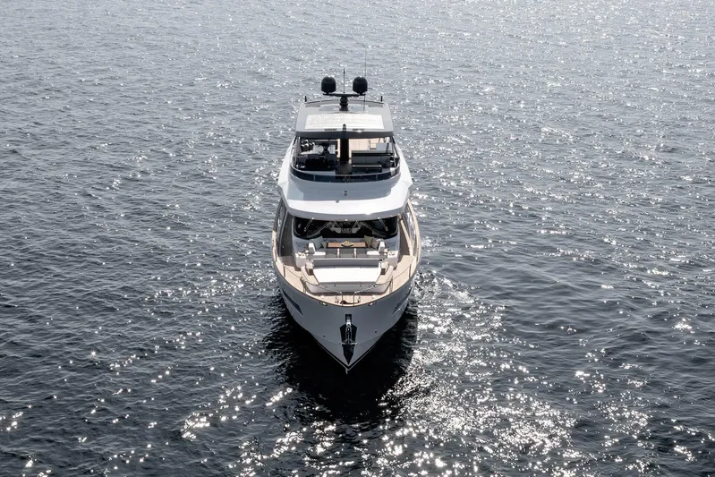  Yacht Photos Pics Luxury Sirena 68 yacht cruising on sparkling water, 2022 model.