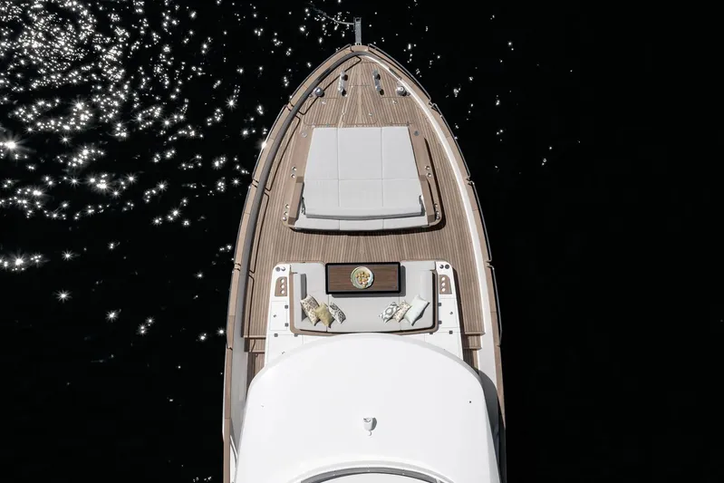  Yacht Photos Pics Aerial view of 2022 Sirena 68 yacht's deck on sparkling water.
