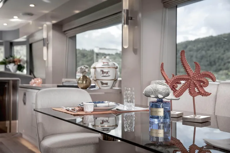  Yacht Photos Pics Luxurious interior of 2022 Sirena 68 yacht with elegant decor and scenic views.