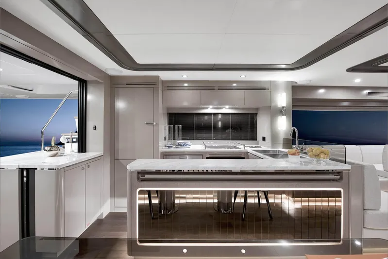  Yacht Photos Pics Luxurious interior of 2022 Sirena 68 yacht featuring modern kitchen design.