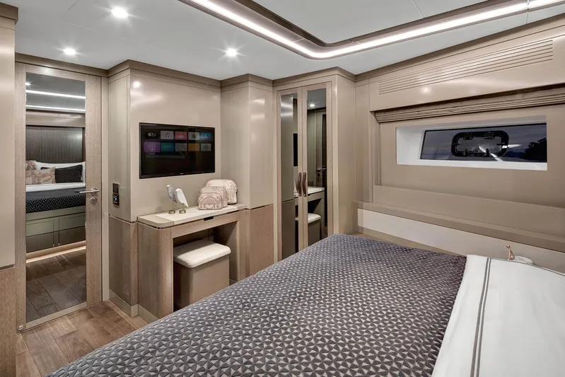  Yacht Photos Pics Luxurious interior of 2022 Sirena 68 yacht cabin with modern design and elegant furnishings.
