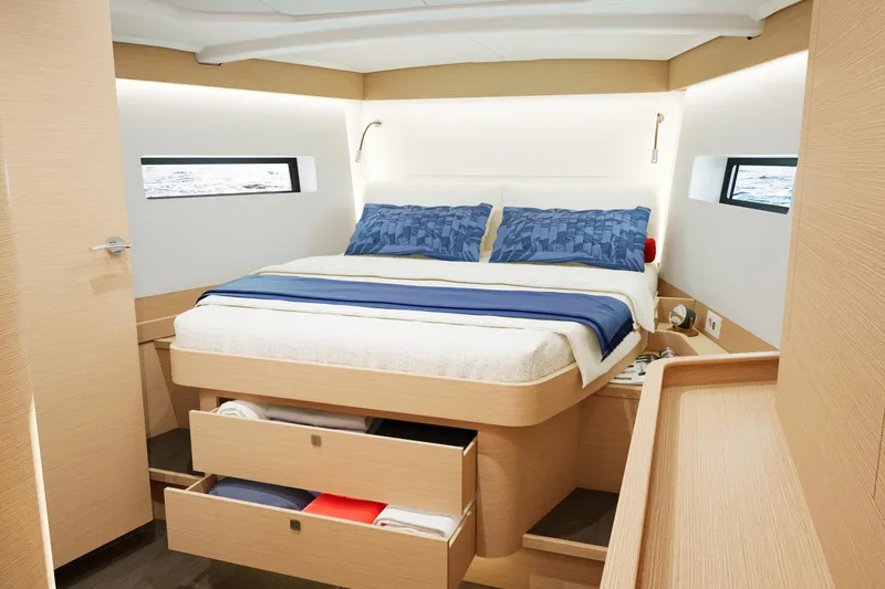  Yacht Photos Pics Luxurious cabin interior of 2026 Jeanneau Sun Odyssey 455 yacht with modern design.