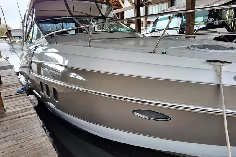  Yacht Photos Pics 2008 Cruisers Yachts 330 Express docked, showcasing sleek design and modern features.