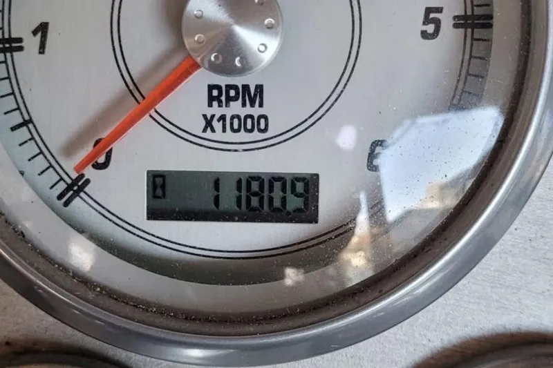  Yacht Photos Pics Close-up of 2008 Cruisers Yachts 330 Express tachometer showing 1180.9 RPM.