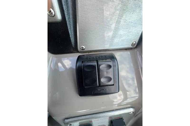  Yacht Photos Pics Control panel of 2008 Cruisers Yachts 330 Express with bow down switch.