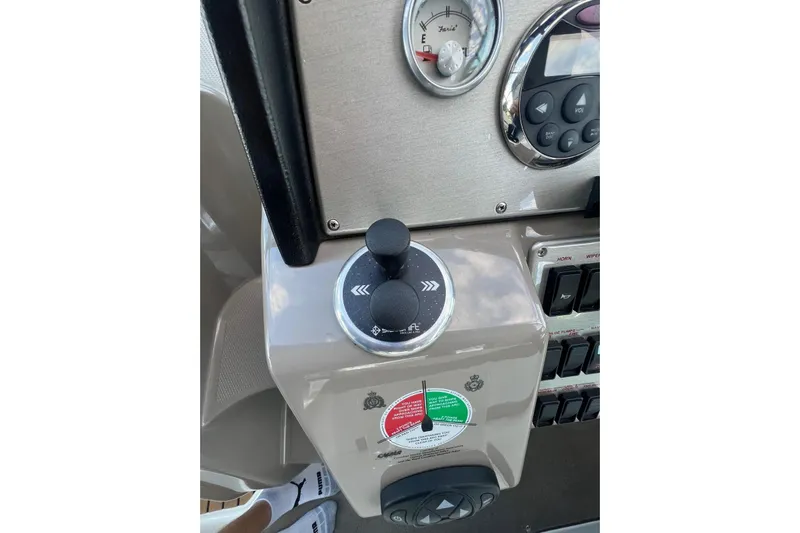  Yacht Photos Pics 2008 Cruisers Yachts 330 Express dashboard with controls and gauges.