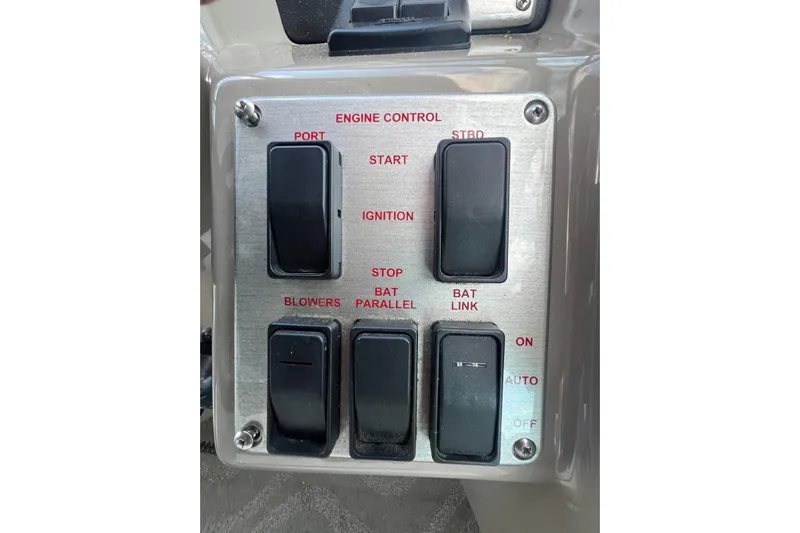  Yacht Photos Pics Control panel of a 2008 Cruisers Yachts 330 Express with labeled switches.