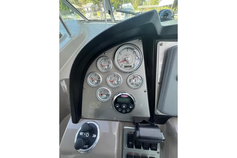  Yacht Photos Pics Dashboard of 2008 Cruisers Yachts 330 Express with gauges and controls.