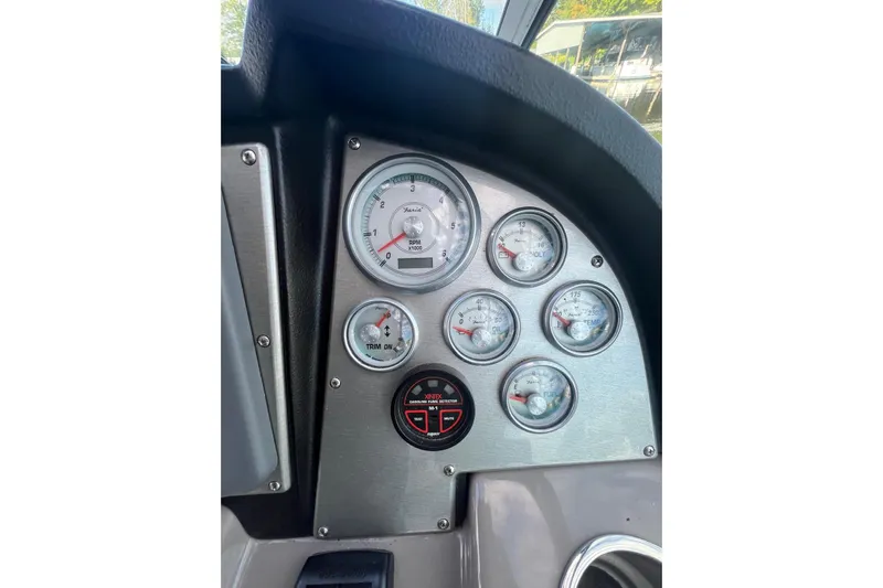  Yacht Photos Pics Dashboard of 2008 Cruisers Yachts 330 Express with gauges and controls.