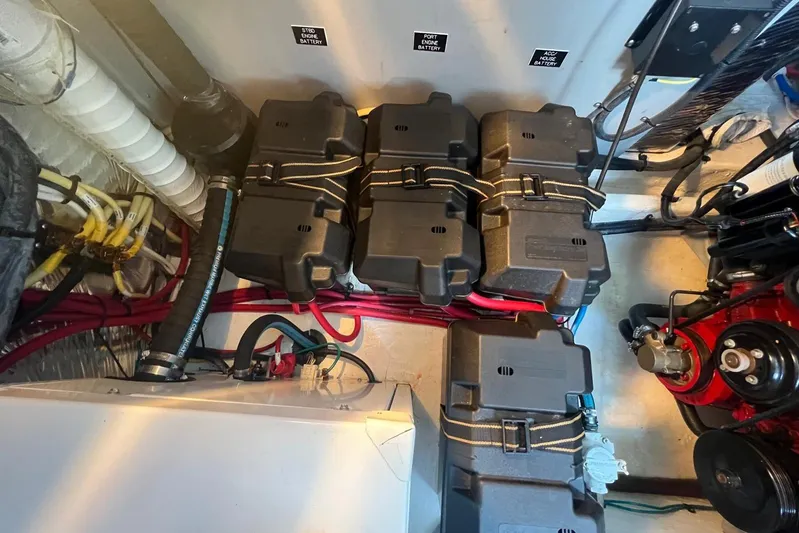  Yacht Photos Pics Engine compartment of 2008 Cruisers Yachts 330 Express with battery boxes and wiring.
