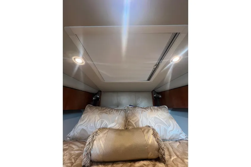  Yacht Photos Pics Luxurious cabin interior of 2008 Cruisers Yachts 330 Express with elegant bedding.