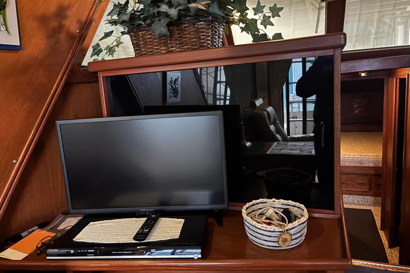 Encore II Yacht Photos Pics Custom cabinetry for stereo and flat screen tv. liquor locker behind