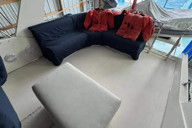 Encore II Yacht Photos Pics Bridge aft with Canoe Cove covered storage locker and space for additional storage and guests