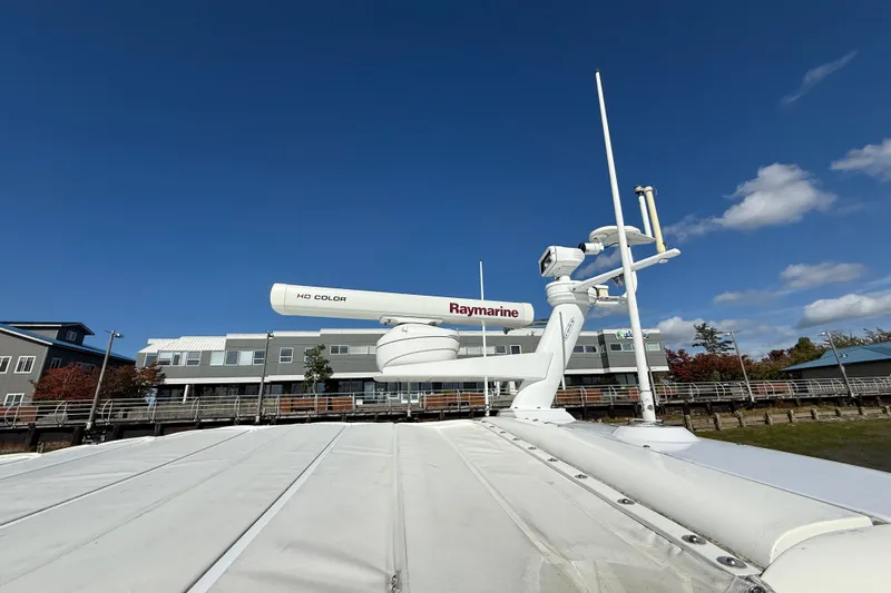  Yacht Photos Pics Radar equipment on a 1998 Sunseeker Predator 63 yacht under a clear blue sky.
