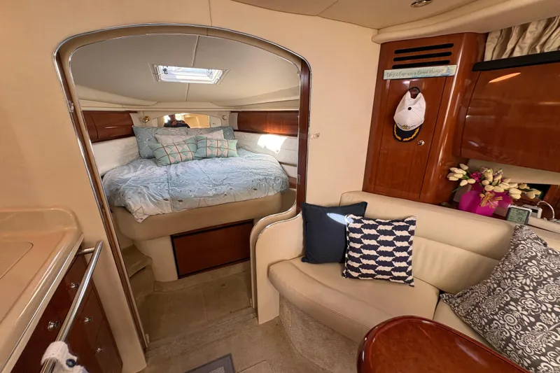 Devocean Yacht Photos Pics Interior of 2003 Sea Ray 360 Sundancer with cozy cabin and elegant decor.
