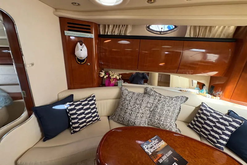 Devocean Yacht Photos Pics Luxurious interior of 2003 Sea Ray 360 Sundancer with plush seating and elegant decor.