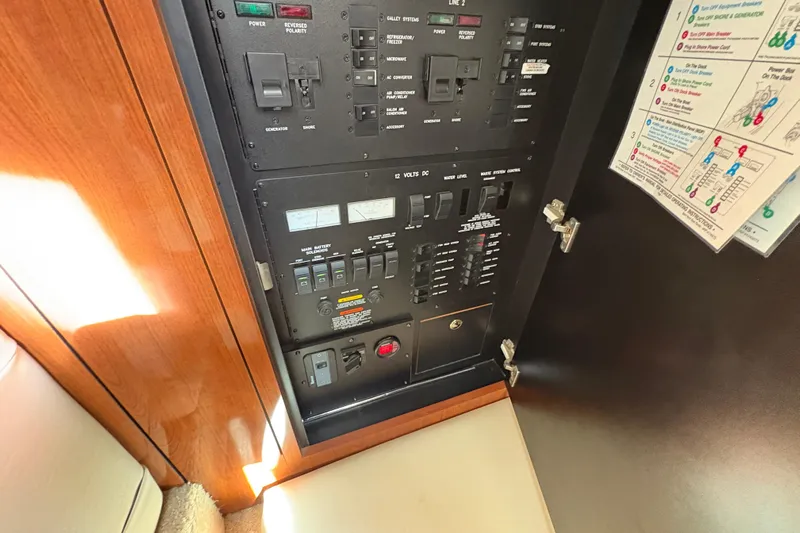 Devocean Yacht Photos Pics Electrical control panel inside a 2003 Sea Ray 360 Sundancer yacht.