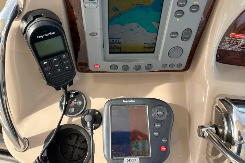 Devocean Yacht Photos Pics Control panel of a 2003 Sea Ray 360 Sundancer with navigation equipment.