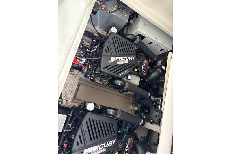 Devocean Yacht Photos Pics Engine compartment of a 2003 Sea Ray 360 Sundancer with Mercury engines.