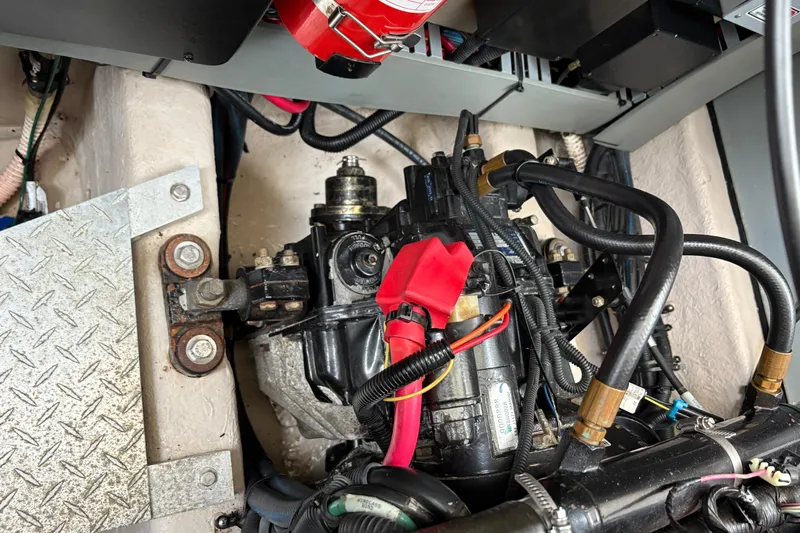 Devocean Yacht Photos Pics Engine compartment of a 2003 Sea Ray 360 Sundancer boat, showing mechanical components.