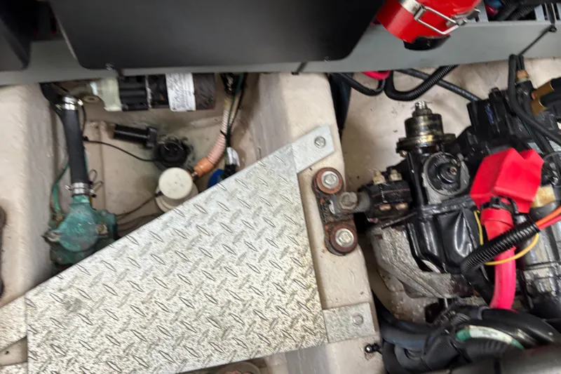 Devocean Yacht Photos Pics Engine compartment of a 2003 Sea Ray 360 Sundancer boat, showing mechanical components.