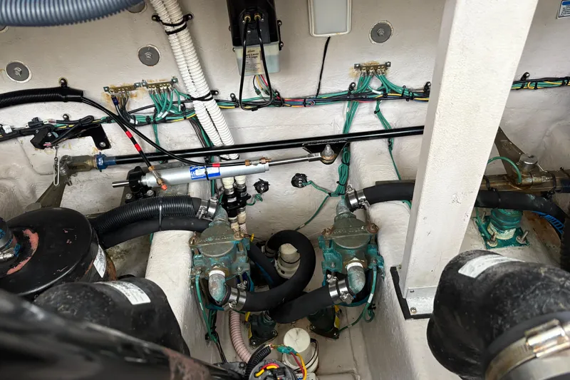 Devocean Yacht Photos Pics Engine compartment of a 2003 Sea Ray 360 Sundancer with visible wiring and components.