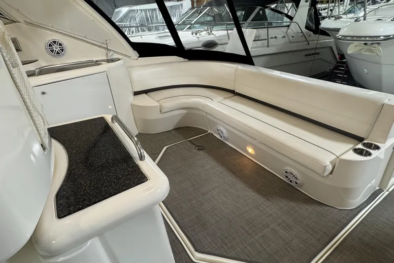  Yacht Photos Pics 2005 Cruisers Yachts 420 Express interior with white seating and modern amenities.