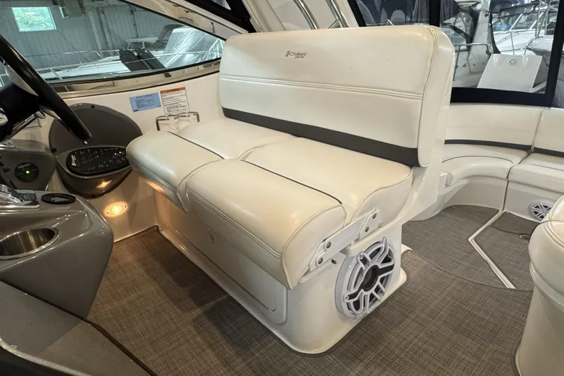  Yacht Photos Pics 2005 Cruisers Yachts 420 Express interior with white seating and control panel.