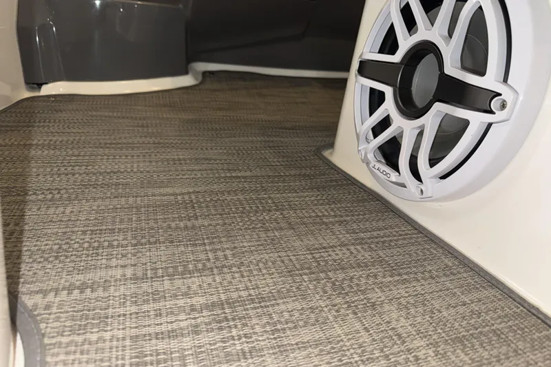  Yacht Photos Pics 2005 Cruisers Yachts 420 Express interior with JL Audio speaker and textured flooring.