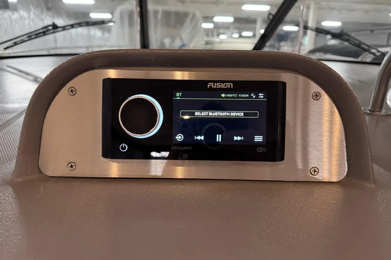  Yacht Photos Pics Fusion audio system on 2005 Cruisers Yachts 420 Express dashboard, displaying Bluetooth options.