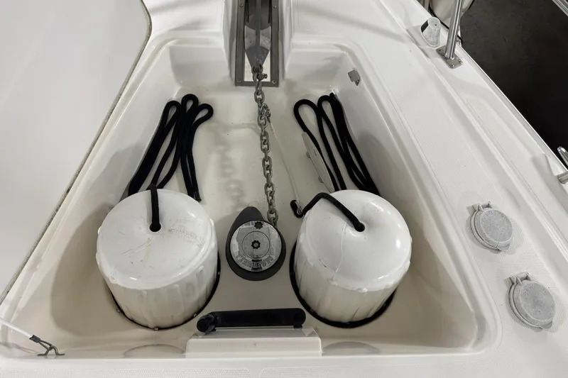  Yacht Photos Pics Anchor locker of 2005 Cruisers Yachts 420 Express with fenders and ropes.