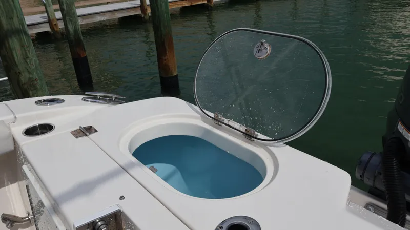 Big Sea Yacht Photos Pics Open livewell on 2020 Cobia 350 Center Console boat at dock.
