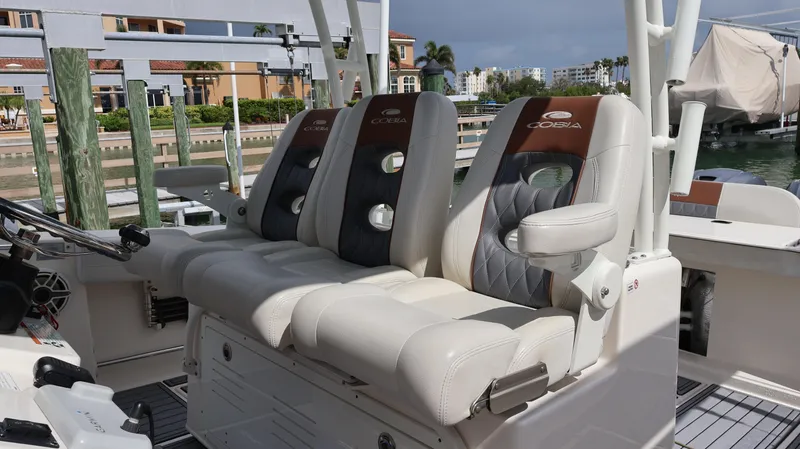 Big Sea Yacht Photos Pics 2020 Cobia 350 Center Console boat seats, luxurious design, docked at marina.