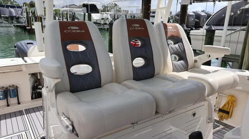 Big Sea Yacht Photos Pics 2020 Cobia 350 Center Console boat seats, luxurious design, docked at marina.