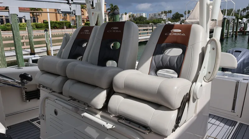 Big Sea Yacht Photos Pics 2020 Cobia 350 Center Console boat seats, luxurious design, docked at marina.