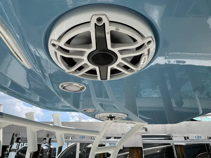 Big Sea Yacht Photos Pics 2020 Cobia 350 Center Console boat with mounted speaker and rod holders.