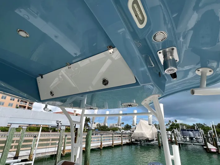Big Sea Yacht Photos Pics 2020 Cobia 350 Center Console boat with blue overhead view at marina.