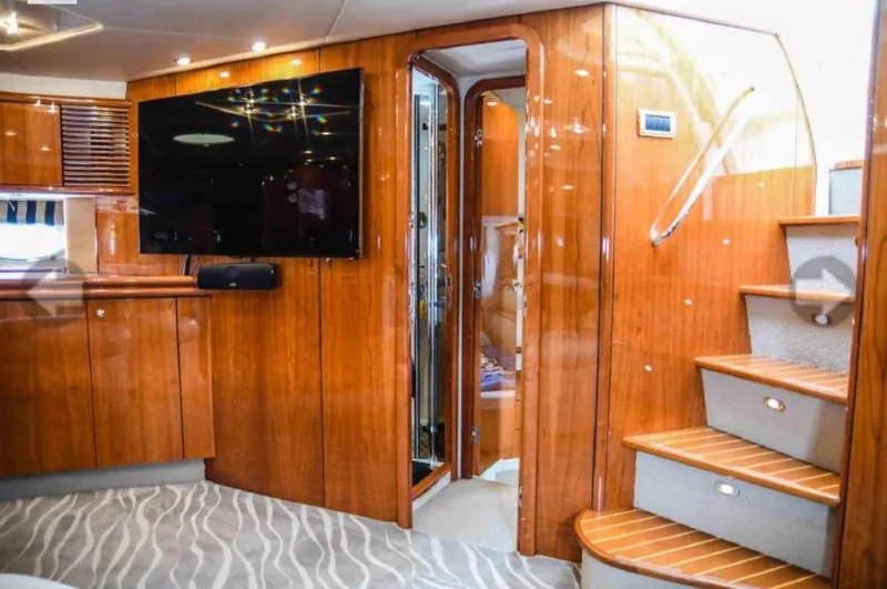  Yacht Photos Pics Luxurious interior of 1998 Sunseeker Predator 63 yacht with wooden finishes and modern amenities.