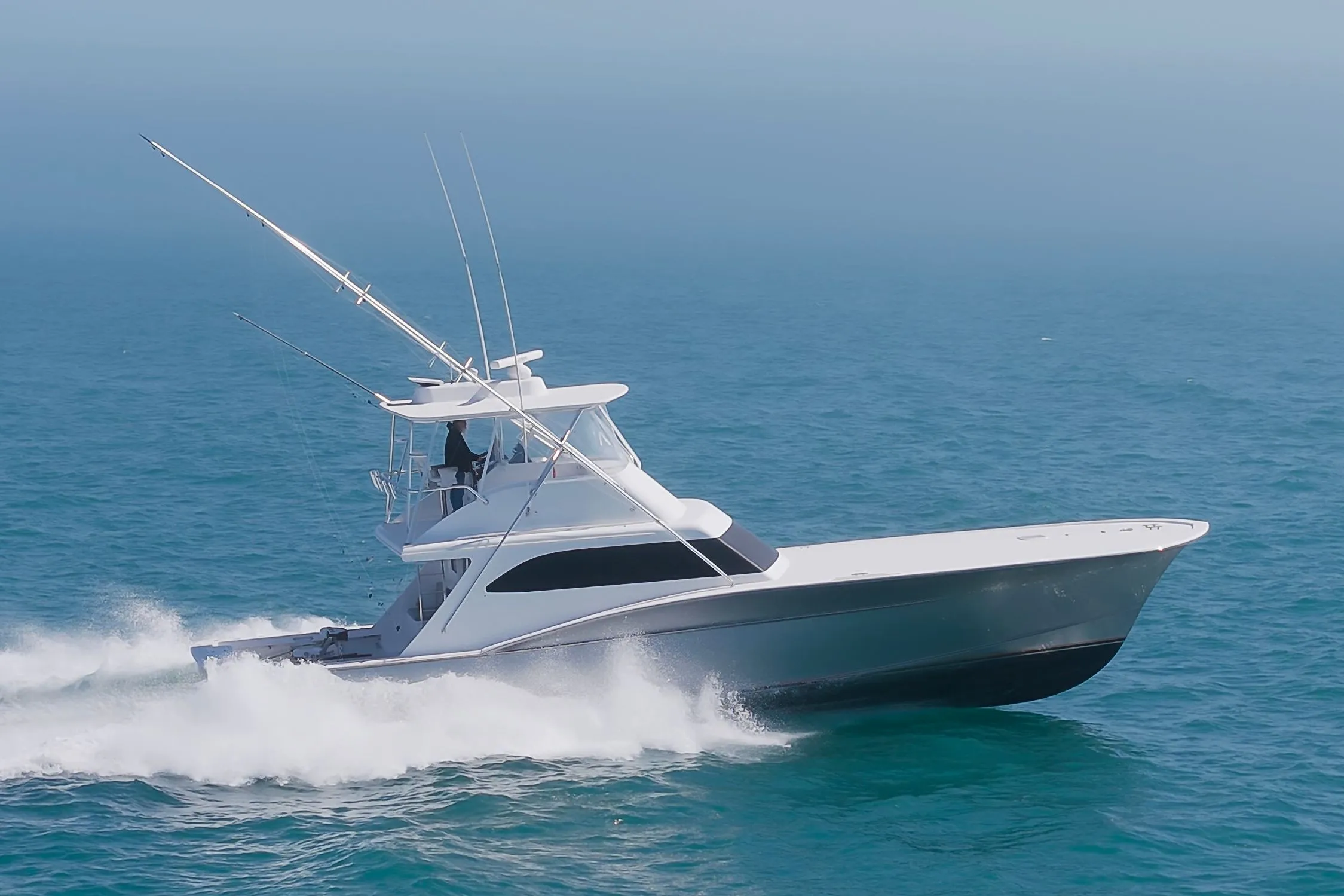 Custom Carolina Terry Guthrie Sportfish 2000 cruising on open sea.