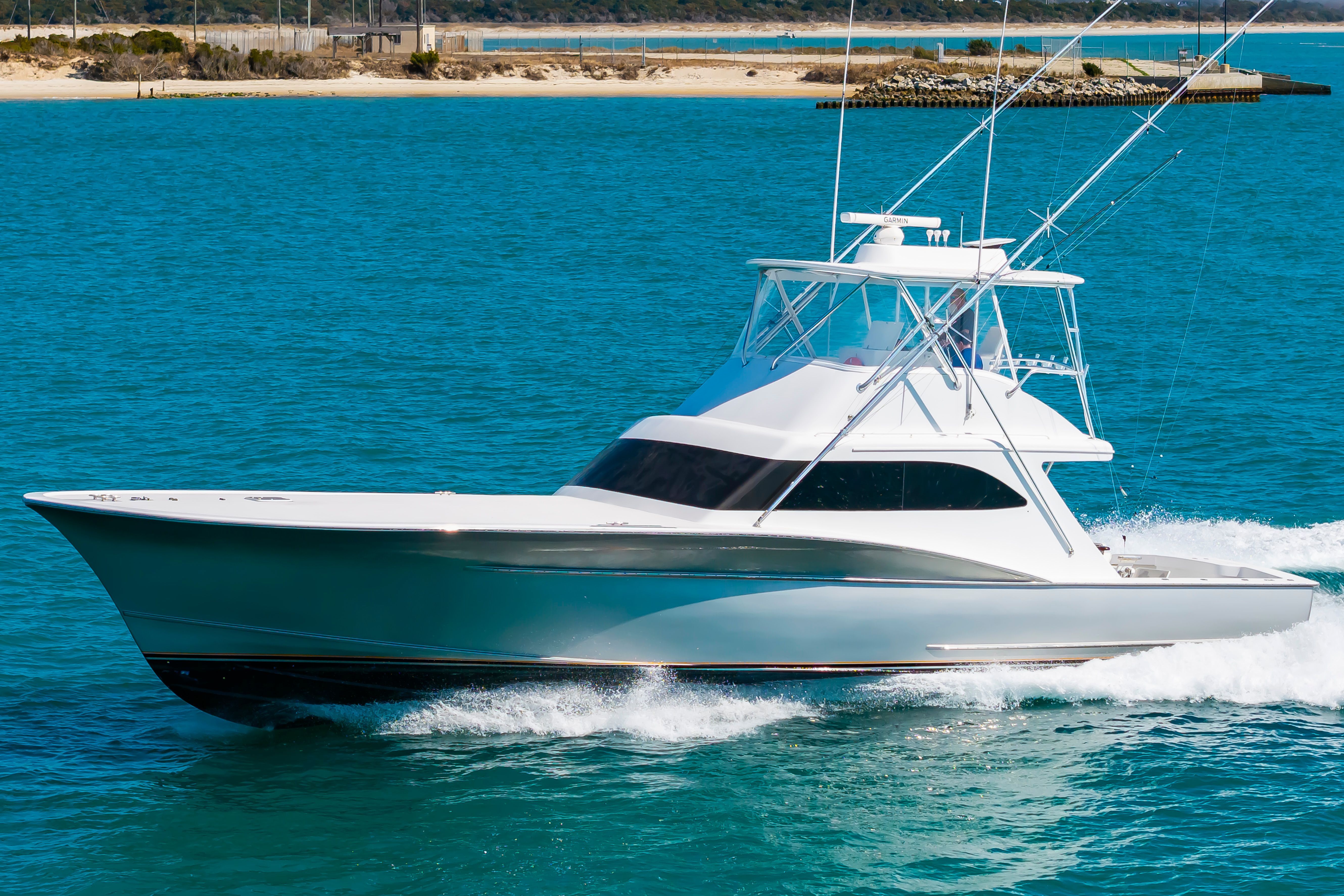 Custom Carolina Terry Guthrie Sportfish 2000 on blue water.