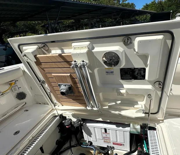  Yacht Photos Pics 2017 Boston Whaler 380 Outrage engine compartment with detailed components and equipment.