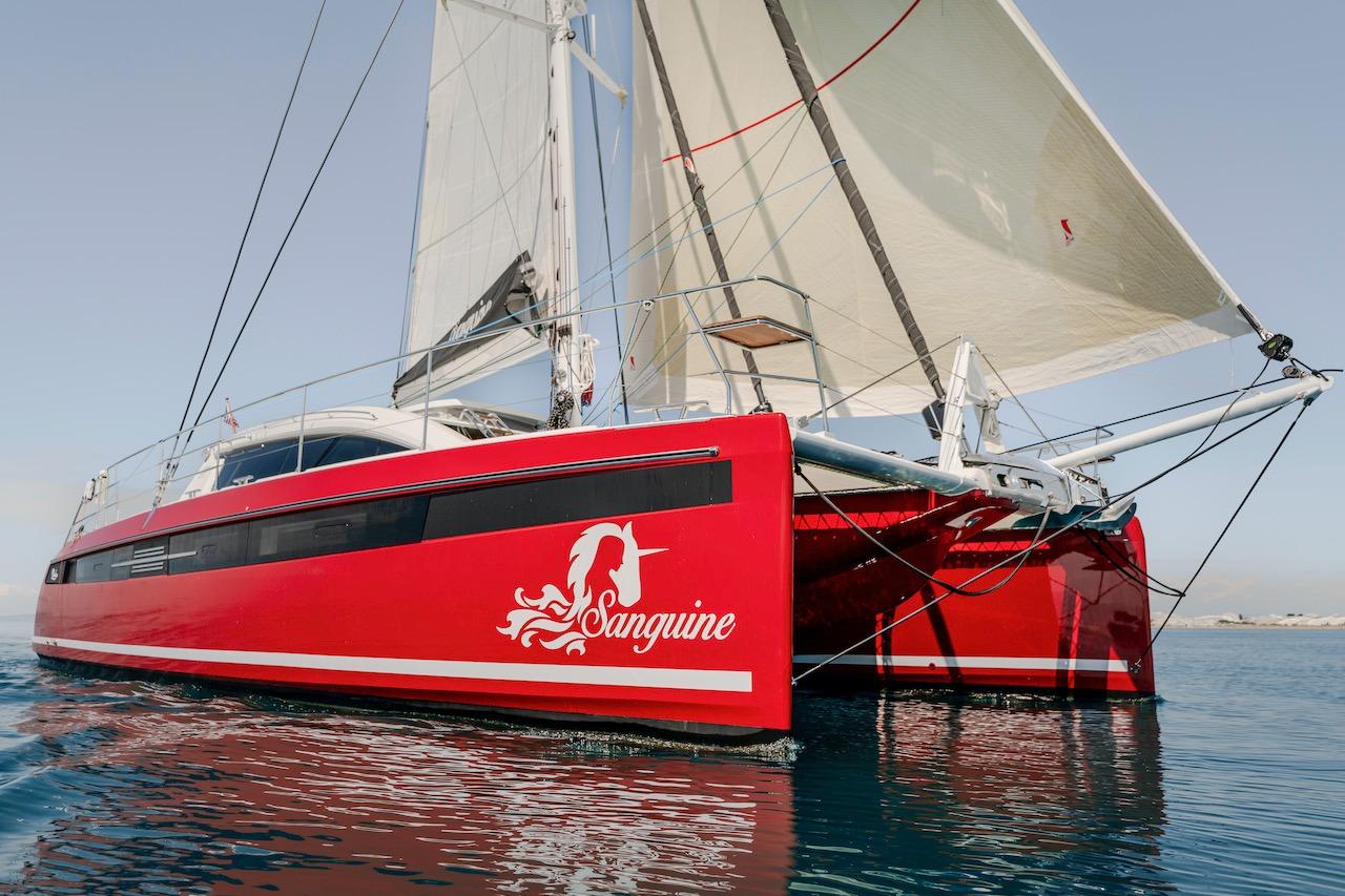 Red Privilege Signature 510 yacht, 2025 model, sailing on calm waters.