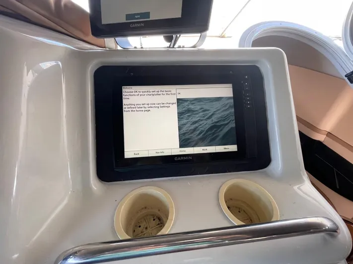 Relentless Yacht Photos Pics 1998 Carver 530 Voyager Pilothouse dashboard with Garmin navigation display.