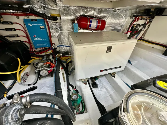 Southern Cross Yacht Photos Pics Engine room of 2017 MJM 50z with electrical components and fire extinguisher.